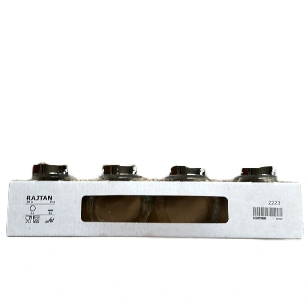 IKEA set of four Rajtan glass spice jars with silver lids